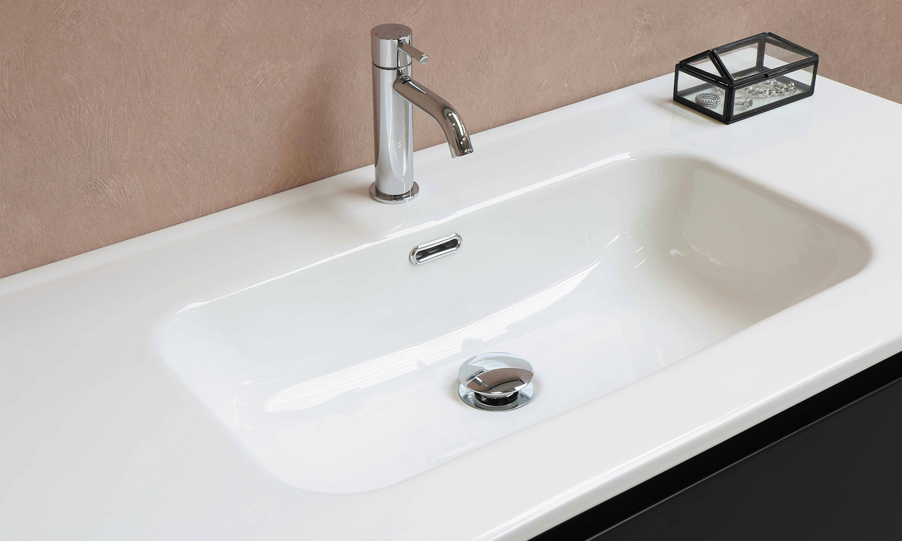White vanity top sink with chrome faucet