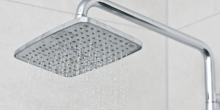 The small bucket is a shower head, the large one is a rain head